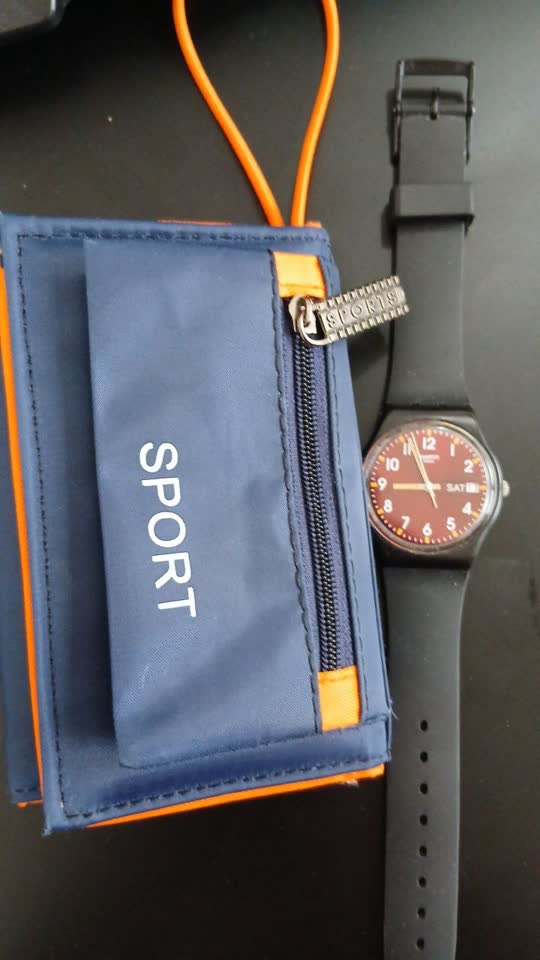 Satovi Swatch i mali novčanik