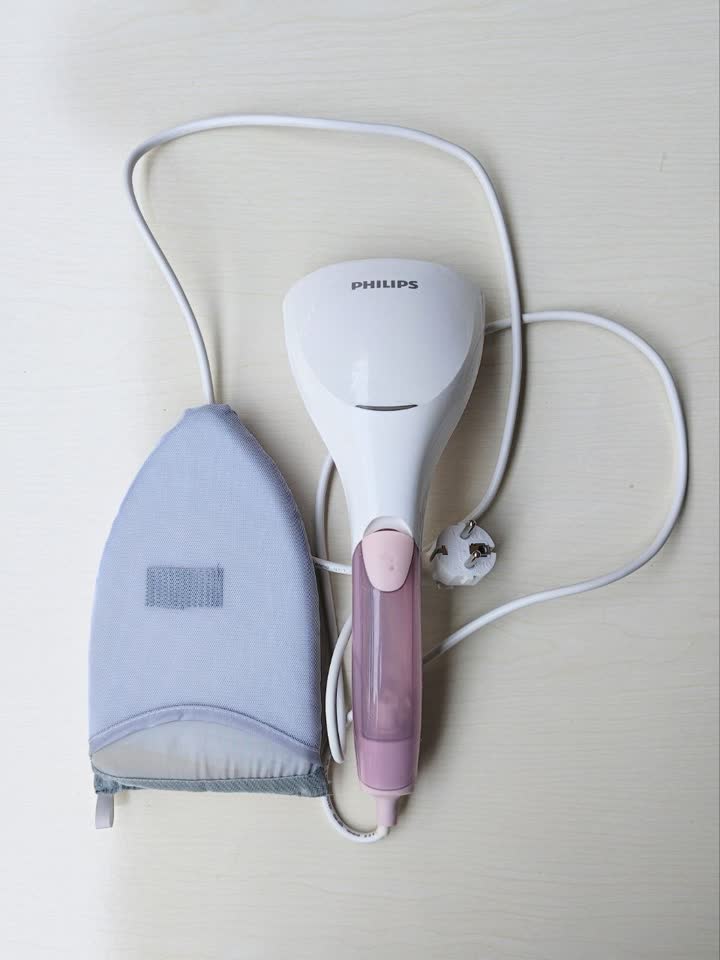 Ručni paročistač Philips i rukavica za parenje