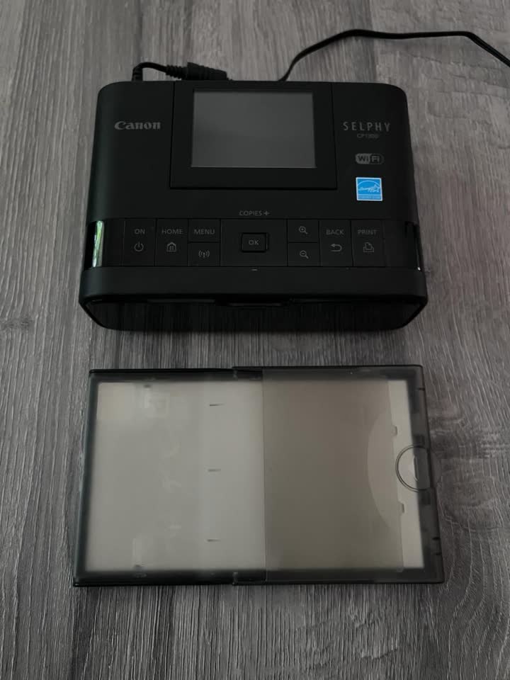 Продам компактный фотопринтер Canon Selphy CP1300