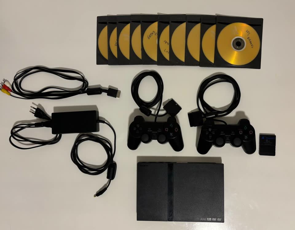 Sony PlayStation 2 Slim (чипованная) + 2 геймпада + 50+ игр