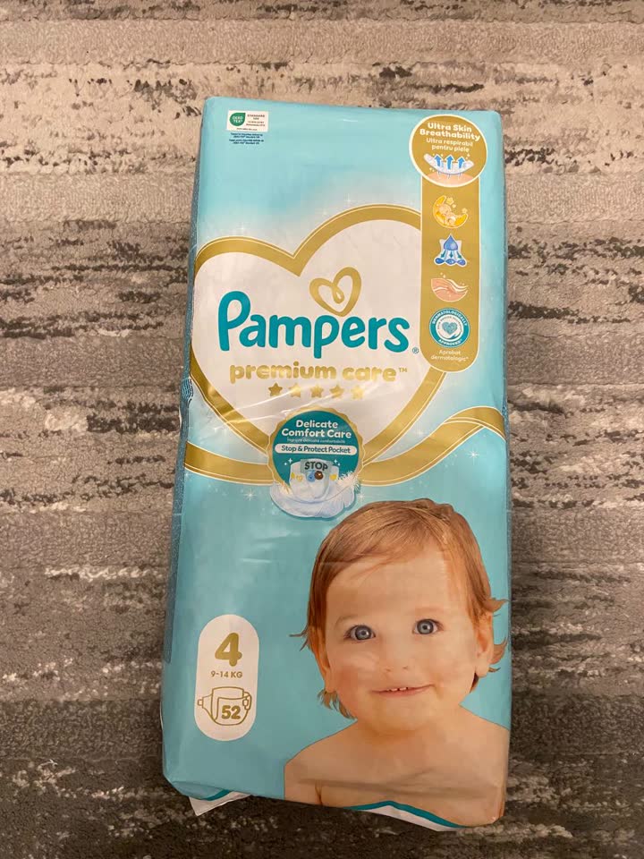 Продаю пачку подгузников Pampers Premium Care #4