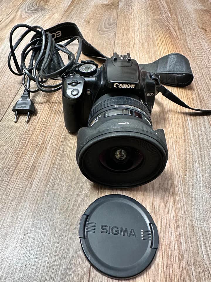 Продаю зеркальный фотоаппарат Canon EOS с широкоугольным объективом Sigma